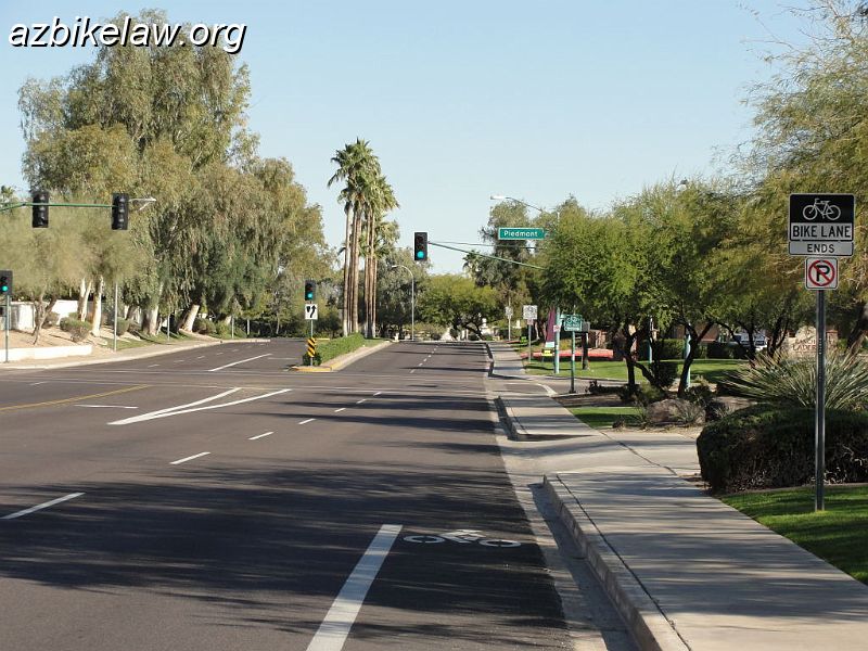 DSC01607-.JPG - possible sign-pollution: bike lane, bike route, BMUFL, 35mph speed limit all in rapid succession perhaps 100' apart each. (not counting the street sign, which is higher). Are drivers really absorbing it?