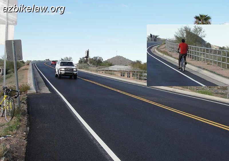 GuadalupeBridgeUp.jpg - Guadalupe Bridge, seen from the east approach. The asphalt section was re-done 1/14/2012. An edge line was placed. The inset shows a bicyclist using the ~ 1' asphalt shoulder.
