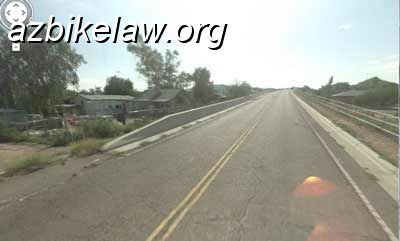 GuadalupeBridgeUpOld.jpg - Undated screen grab of google street view -- probably a couple of years old(?) as the asphalt kept getting worse, and the edge lines weren't much visible just prior to Jan 2012. The new edge line scheme remains the same.