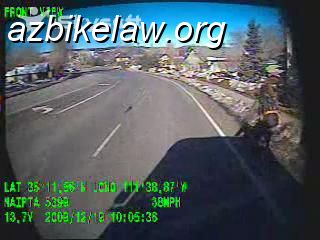 vlcsnap-2132092.JPG - Cyclist's left edge is basically above the stripe, just prior to pass.