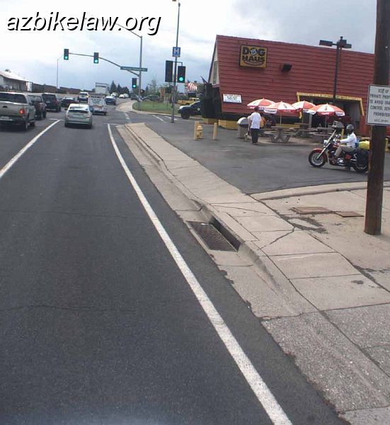 Rt66atSwitzer.jpg - Route 66 near the intersection of Switzer Canyon Road, Flagstaff, AZ. Note that this is NO bike lane here. Note that in summer of 2009 the edge line picuted here was obliterated and moved ~ 10" to the left. (this photo taken 5/19/2009), see next photo